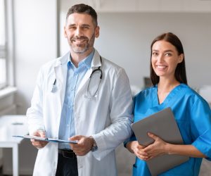 Portrait,Of,Doc,Man,And,Lady,Posing,In,Clinic,And Portrait,Of,Doc,Man,And,Lady,Posing,In,Clinic,And